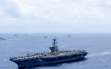 Multinational ships sail in formation during RIMPAC 2026