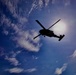 U.S. Army and Malaysian troops coordinate a simulated air-to-ground assault