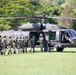 U.S. Army and Malaysian troops coordinate a simulated air-to-ground assault
