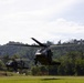 U.S. Army and Malaysian troops coordinate a simulated air-to-ground assault