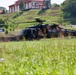 U.S. Army and Malaysian troops coordinate a simulated air-to-ground assault