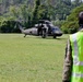 U.S. Army and Malaysian troops coordinate a simulated air-to-ground assault