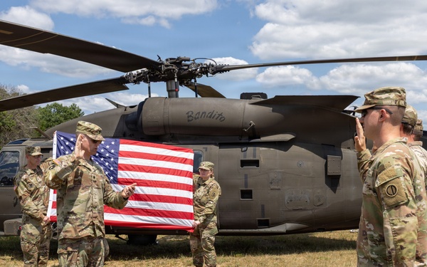 Soldiers Reenlist in Front of Black Hawk