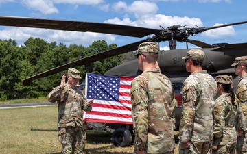Soldiers Reenlist in Front of Black Hawk