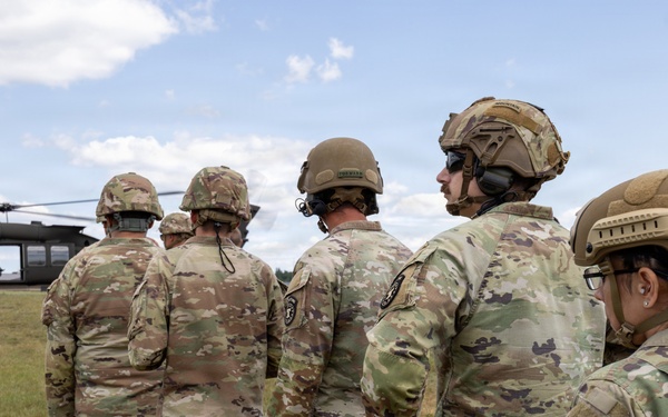 Soldiers wait to Board Black Hawk