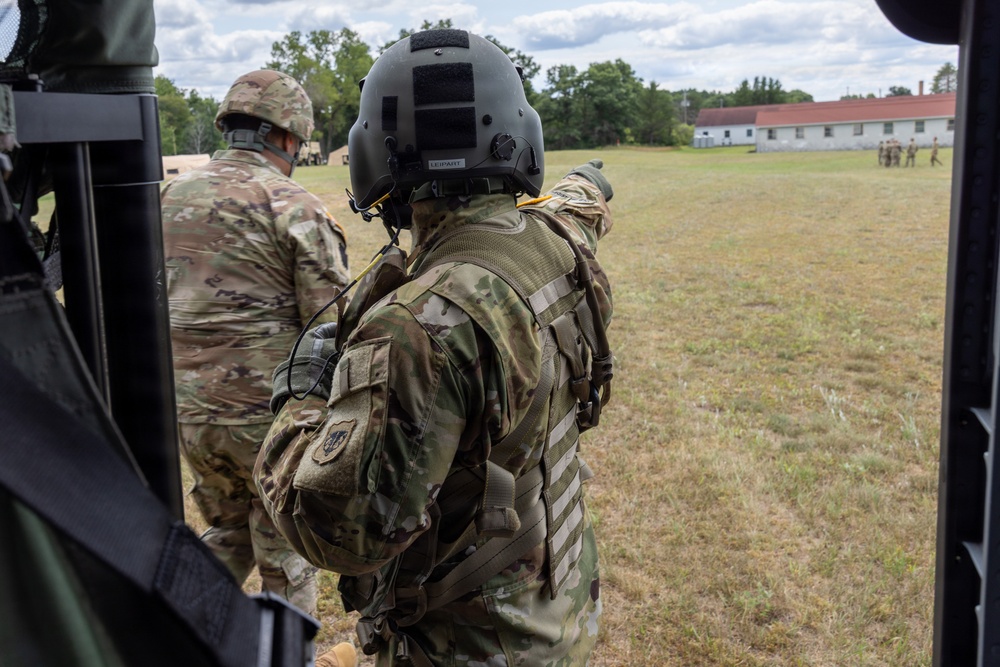 Crew Chief Directs Soldiers to Safe Exit