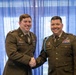 U.S. Army Lt. Col. Travis Moore promotes Capt. Matthew Standridge to the rank of major