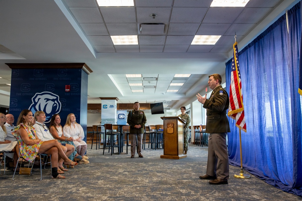 U.S. Army Lt. Col. Travis Moore promotes Capt. Matthew Standridge to the rank of major