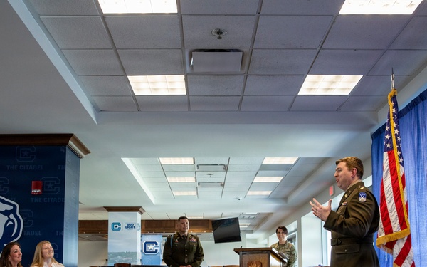 U.S. Army Lt. Col. Travis Moore promotes Capt. Matthew Standridge to the rank of major