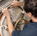 Michael Murphy Sailor Performs Hatch Maintenance