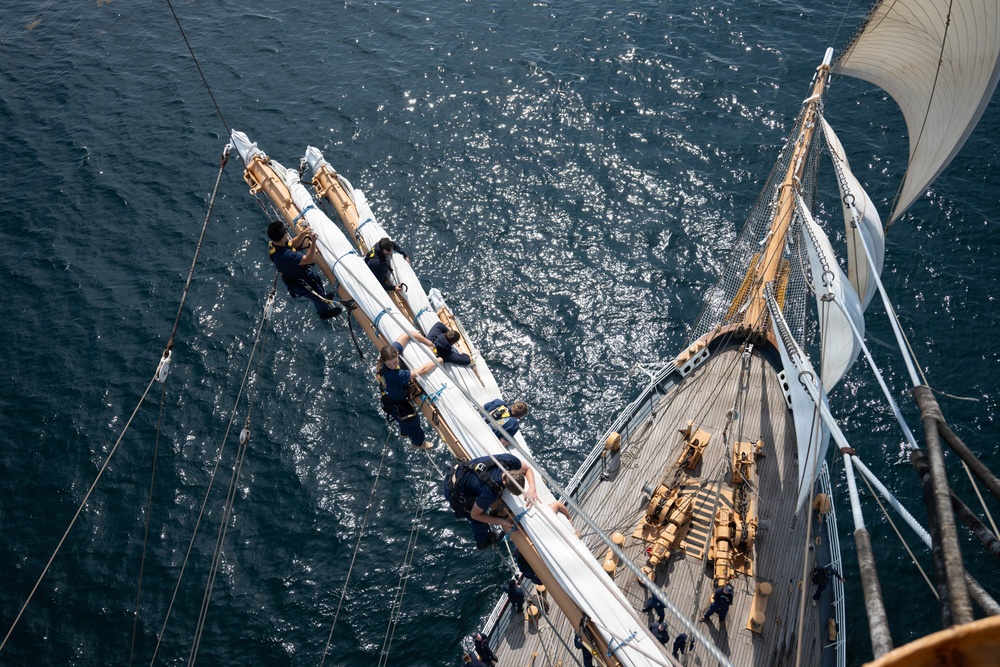 USCGC Eagle cadets work aloft
