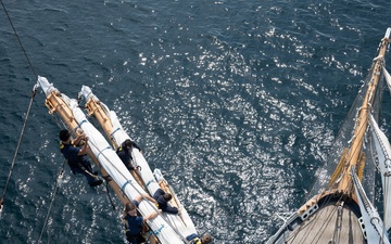 USCGC Eagle cadets work aloft