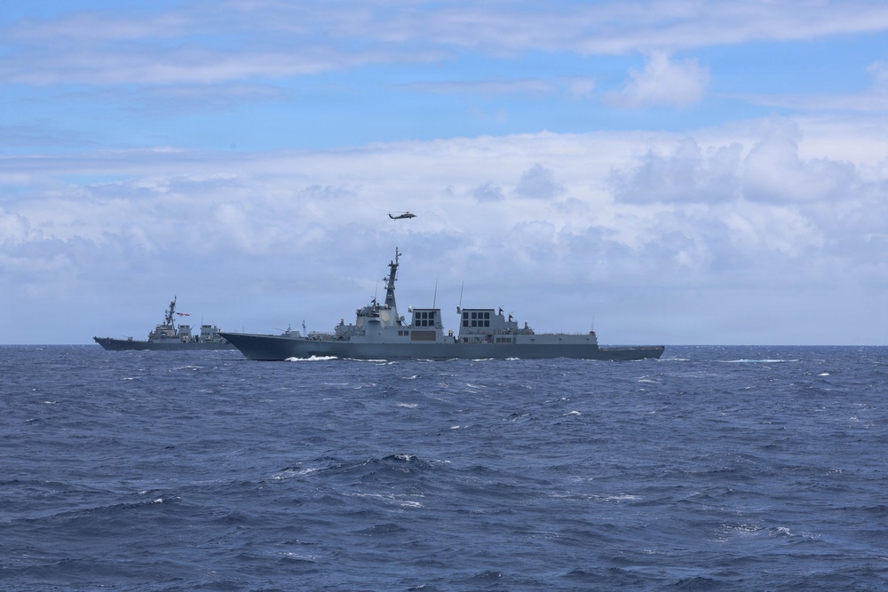 Partner nations participate in group sail lead by the USS Theodore Roosevelt during RIMPAC 26