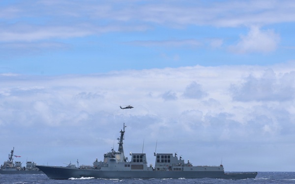 Partner nations participate in group sail lead by the USS Theodore Roosevelt during RIMPAC 26