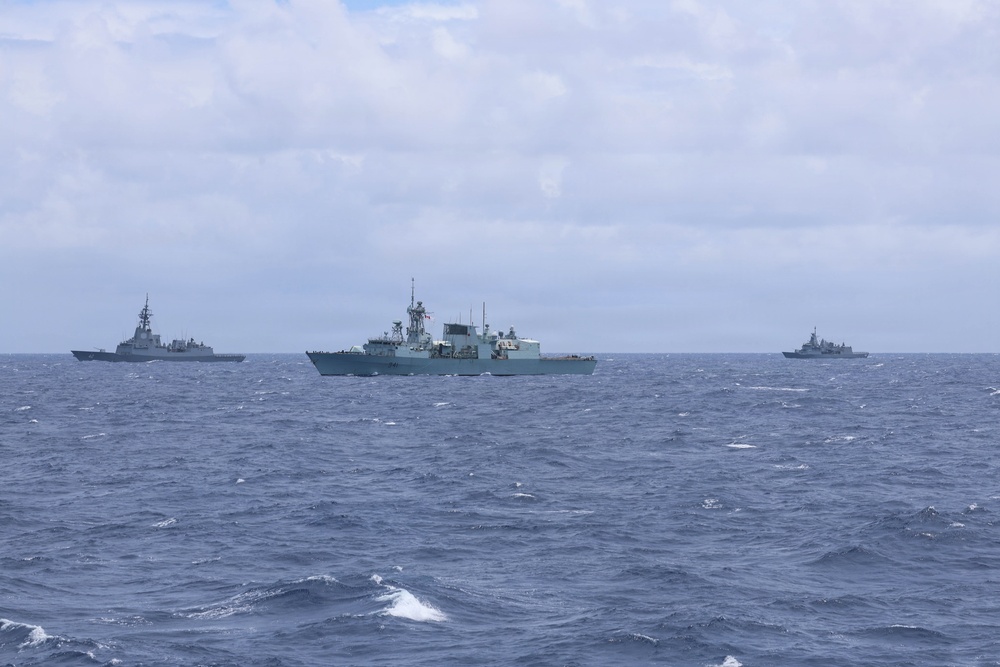 Partner nations participate in group sail lead by the USS Theodore Roosevelt during RIMPAC 26