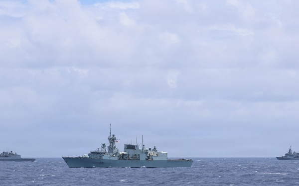 Partner nations participate in group sail lead by the USS Theodore Roosevelt during RIMPAC 26