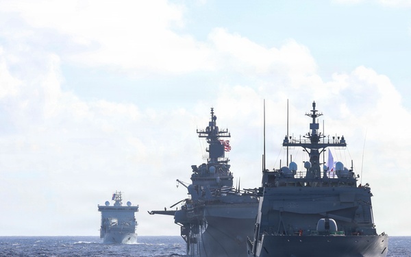 Partner nations participate in group sail lead by the USS Theodore Roosevelt during RIMPAC 26