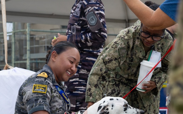 Therapy dogs boost morale at Pacific Warfighting Center during RIMPAC 2026