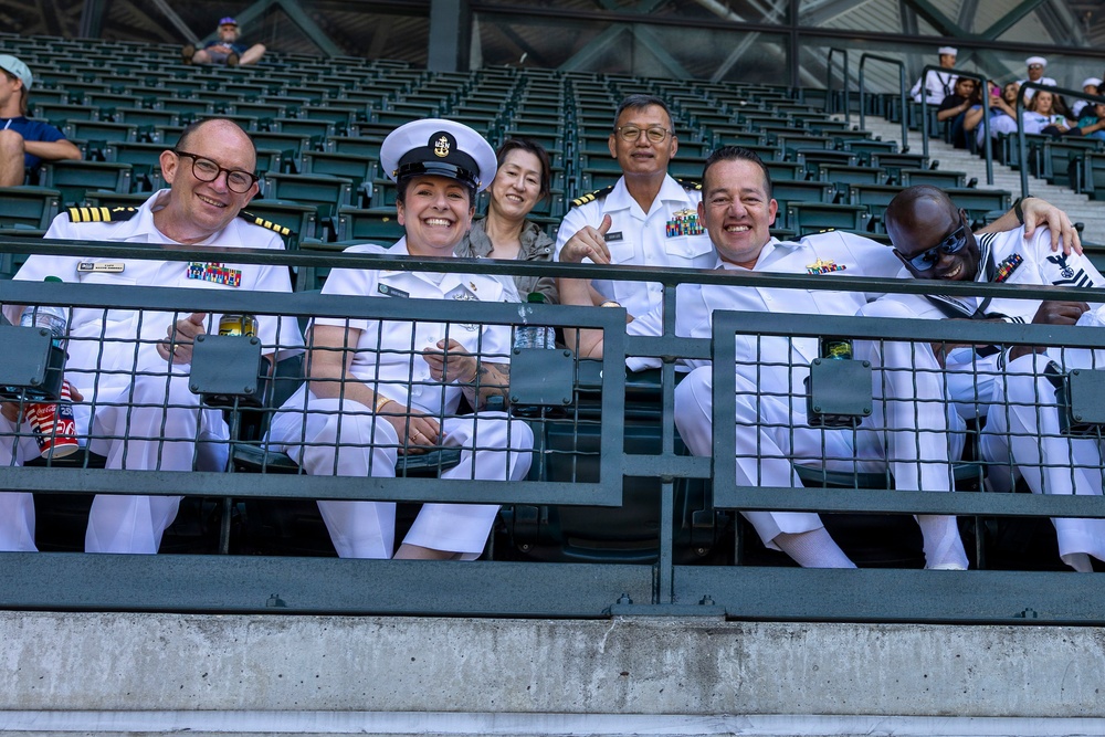 U.S. Navy Sailors attend a Seattle Mariners baseball game during Seattle Seafair Fleet Week