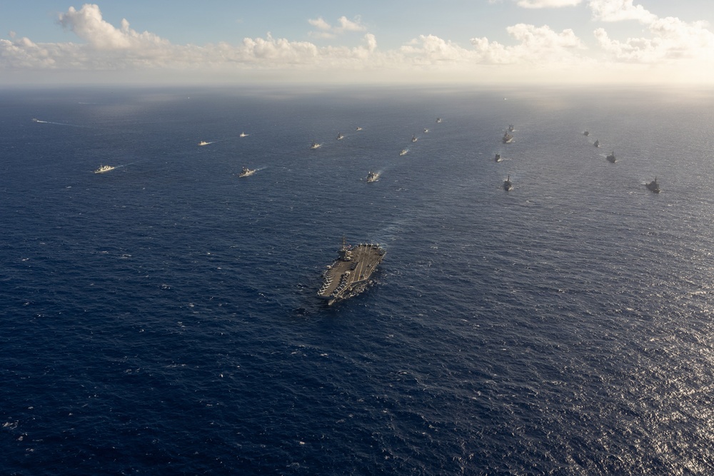 Partner nations participate in group sail lead by the USS Theodore Roosevelt during RIMPAC 26
