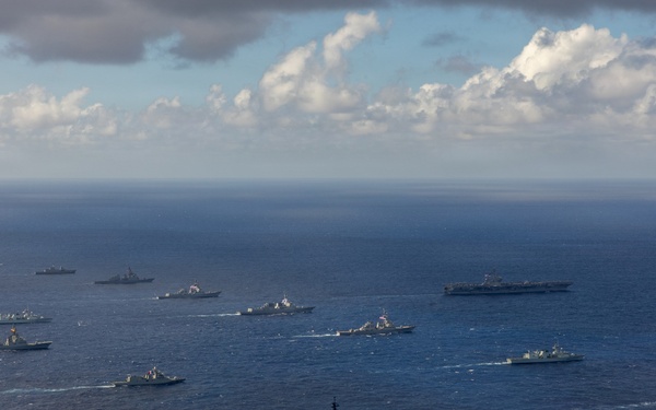 Partner nations participate in group sail lead by the USS Theodore Roosevelt during RIMPAC 26