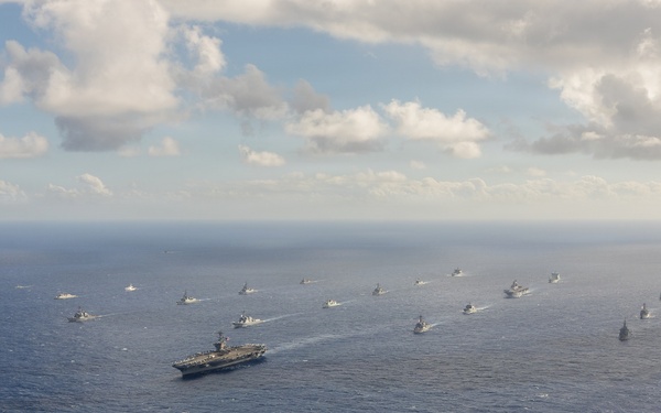 Partner nations participate in group sail lead by the USS Theodore Roosevelt during RIMPAC 26