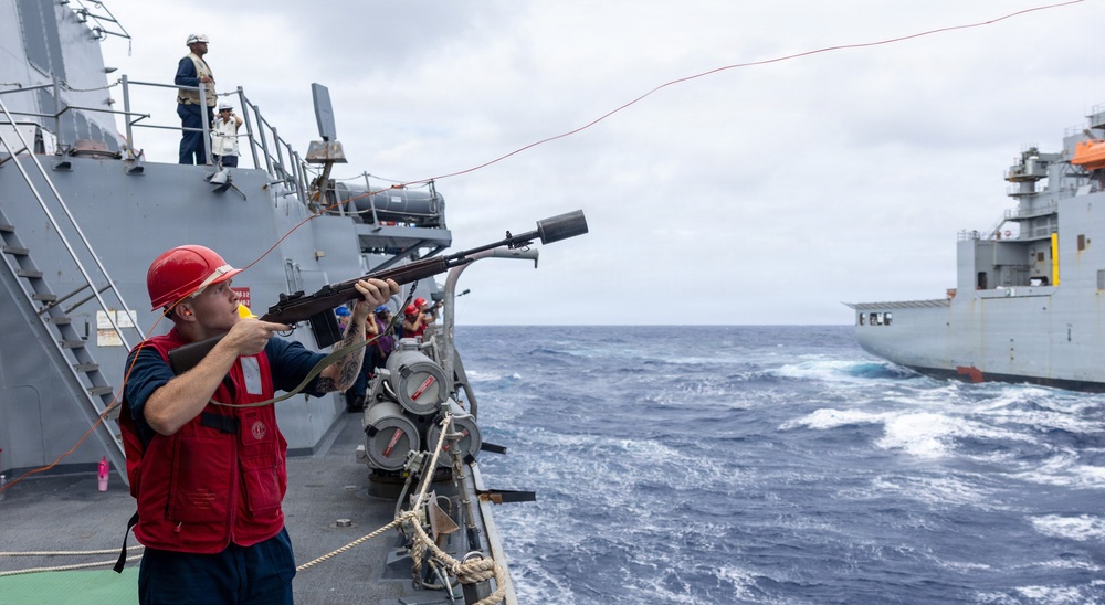 USS Mustin conducts replenishment-at-sea with USNS Wally Schirra