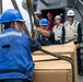 USS Mustin conducts replenishment-at-sea with USNS Wally Schirra