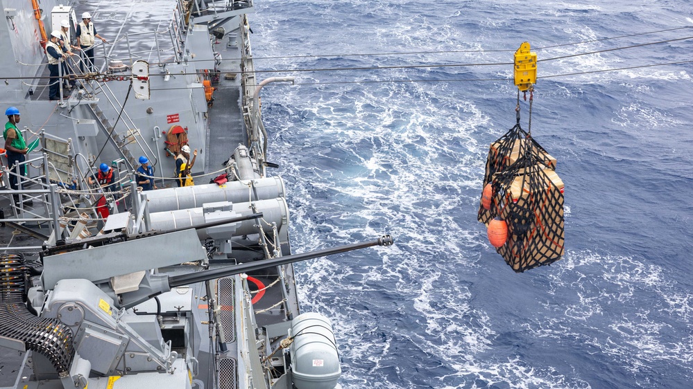 USS Mustin conducts replenishment-at-sea with USNS Wally Schirra