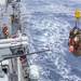 USS Mustin conducts replenishment-at-sea with USNS Wally Schirra