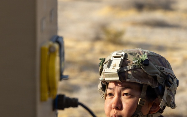 U.S. Army soldier experiments with a Multi-Spectral Tower during PC-C6