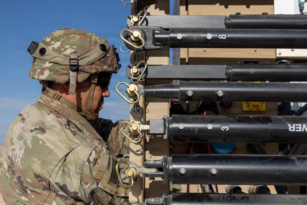 U.S. Army soldier experiments with a Multi-Spectral Tower during PC-C6