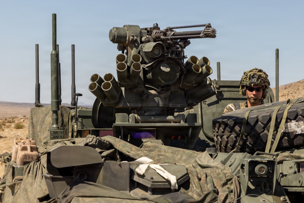 U.S. Army soldier experiments with L-band Tactical Satellite during PC-C6