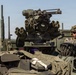 U.S. Army soldier experiments with L-band Tactical Satellite during PC-C6