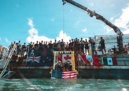 Multinational Navy divers conduct a salvage dive during RIMPAC 26