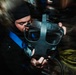 Navy Divers and EOD Technicians Conduct a Shipboard Response Drill