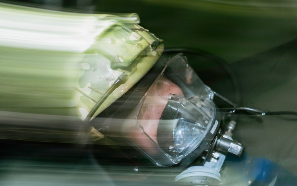 Navy Divers and EOD Technicians Conduct a Shipboard Response Drill