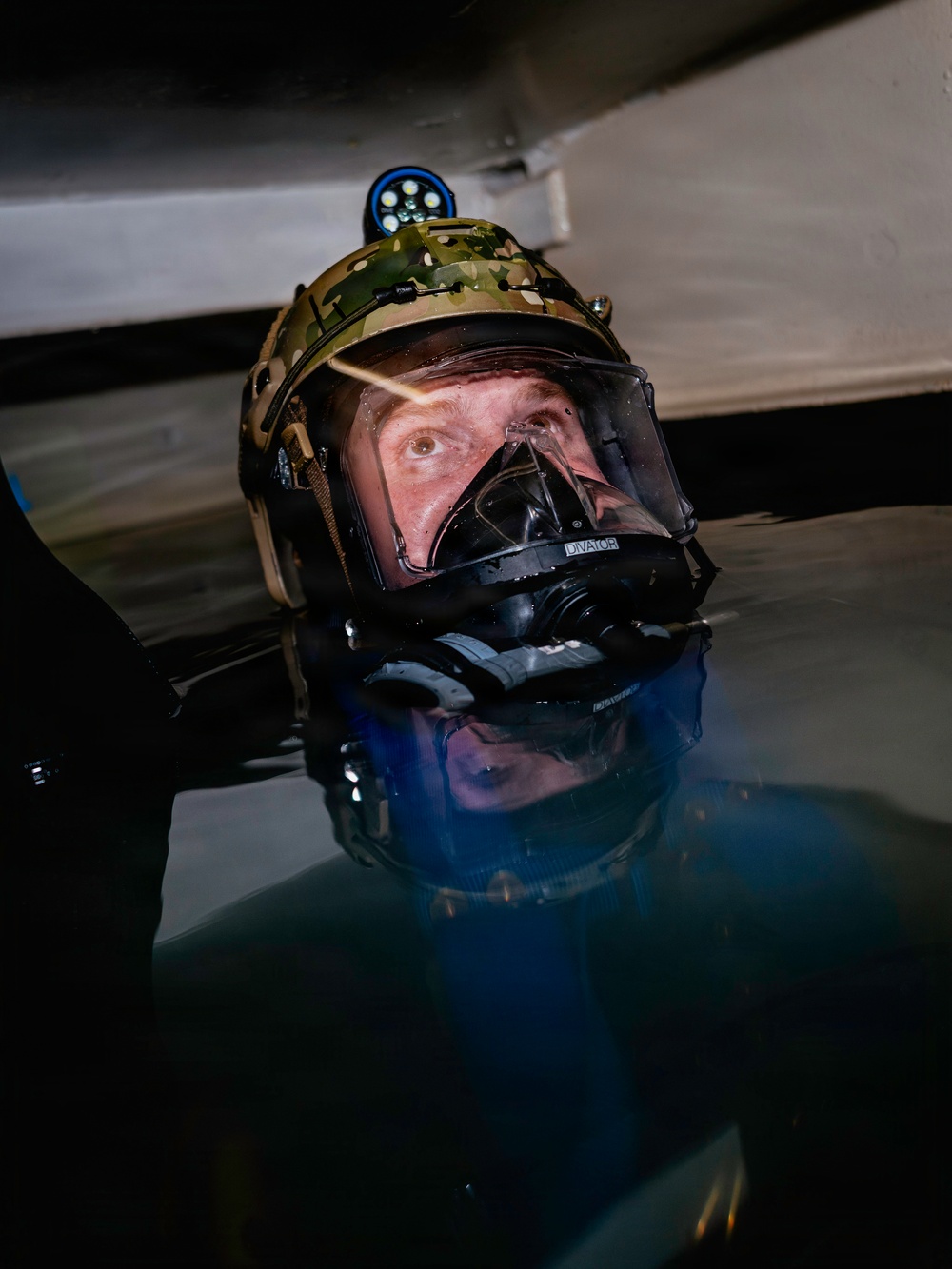Navy Divers and EOD Technicians Conduct a Shipboard Response Drill