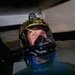 Navy Divers and EOD Technicians Conduct a Shipboard Response Drill