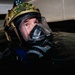 Navy Divers and EOD Technicians Conduct a Shipboard Response Drill