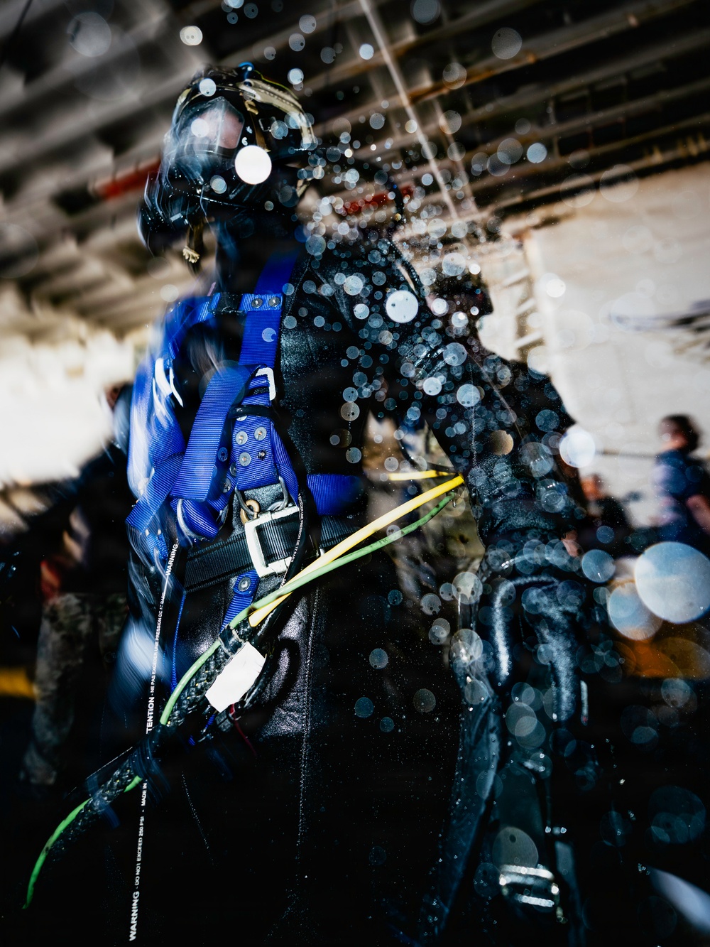 Navy Divers and EOD Technicians Conduct a Shipboard Response Drill