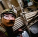 Navy Divers and EOD Technicians Conduct a Shipboard Response Drill