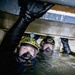Navy Divers and EOD Technicians Conduct a Shipboard Response Drill
