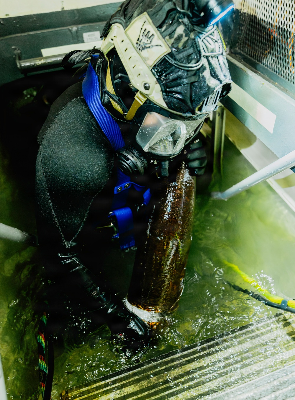 Navy Divers and EOD Technicians Conduct a Shipboard Response Drill