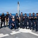 U.S. and Philippine Coast Guard stand in front of V-BAT drone