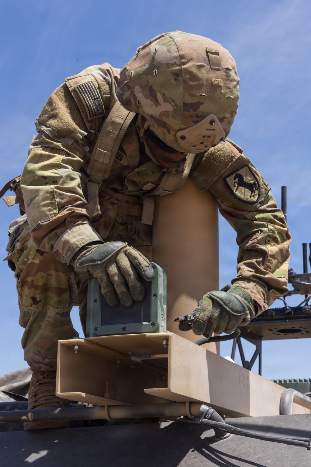 U.S. Army Soldiers experiment with radar and communication systems