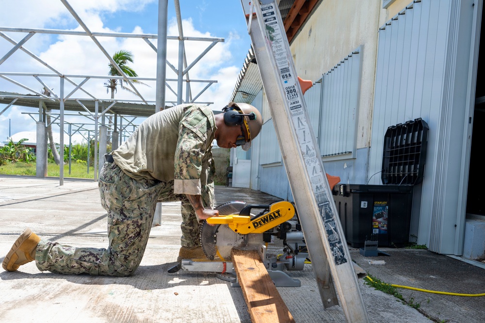 NMCB 1 installs walkway roof at Saipan Southern High School