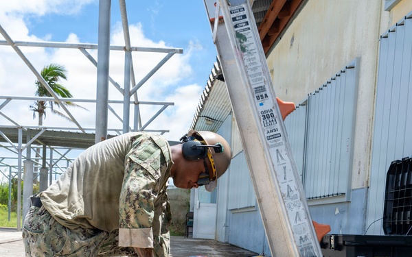 NMCB 1 installs walkway roof at Saipan Southern High School