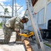 NMCB 1 installs walkway roof at Saipan Southern High School