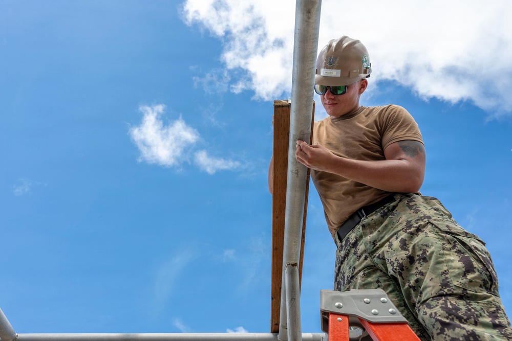 NMCB 1 installs walkway roof at Saipan Southern High School